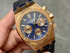 Audemars Piguet Royal Oak watch, blue dial, gold hands, date ring marked '24'