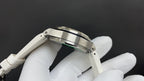 Audemars Piguet watch top view with stainless bezel and crown-side accents