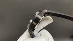 Audemars Piguet wristwatch side view, steel case with dark bracelet