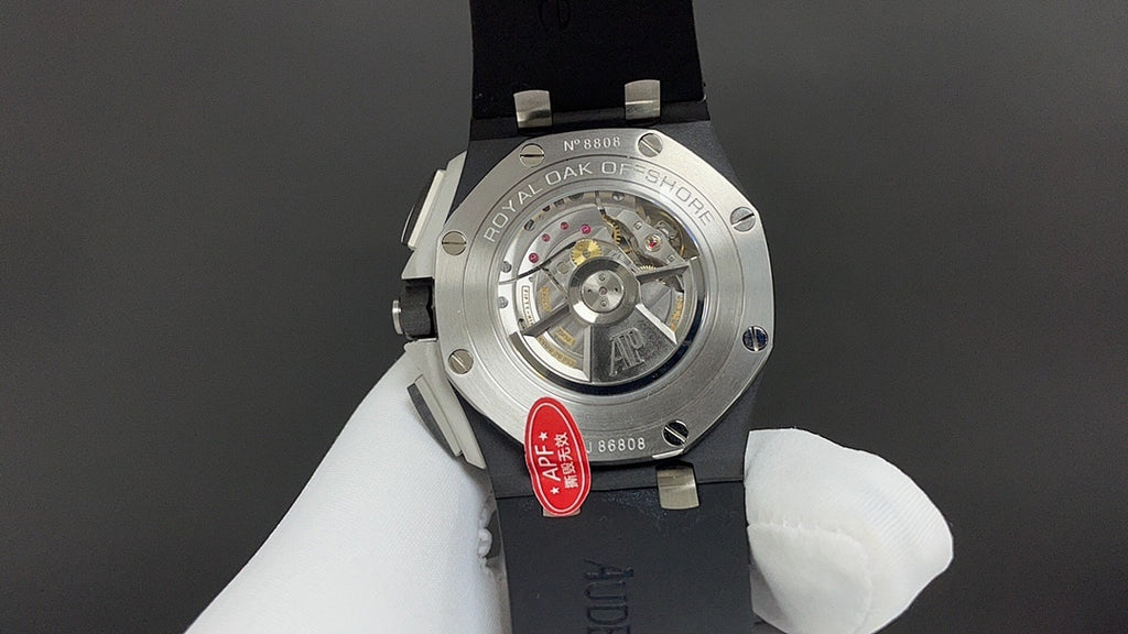 Audemars Piguet wristwatch caseback, visible movement, steel case with dark strap