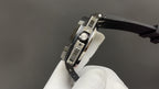Audemars Piguet wristwatch side view, steel case with brushed details and dark clasp