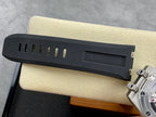 Dark rubber watch strap segment with metal clasp and adjustment holes