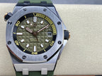 Sports watch front view with green dial, luminous hour markers, metal bezel, green rubber strap