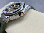 Side view of sports watch with green strap, metal crown, brushed case and bezel