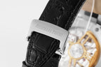 Audemars Piguet watch buckle on black leather strap with engraved clasp