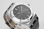 Audemars Piguet watch close-up of dark dial and black strap