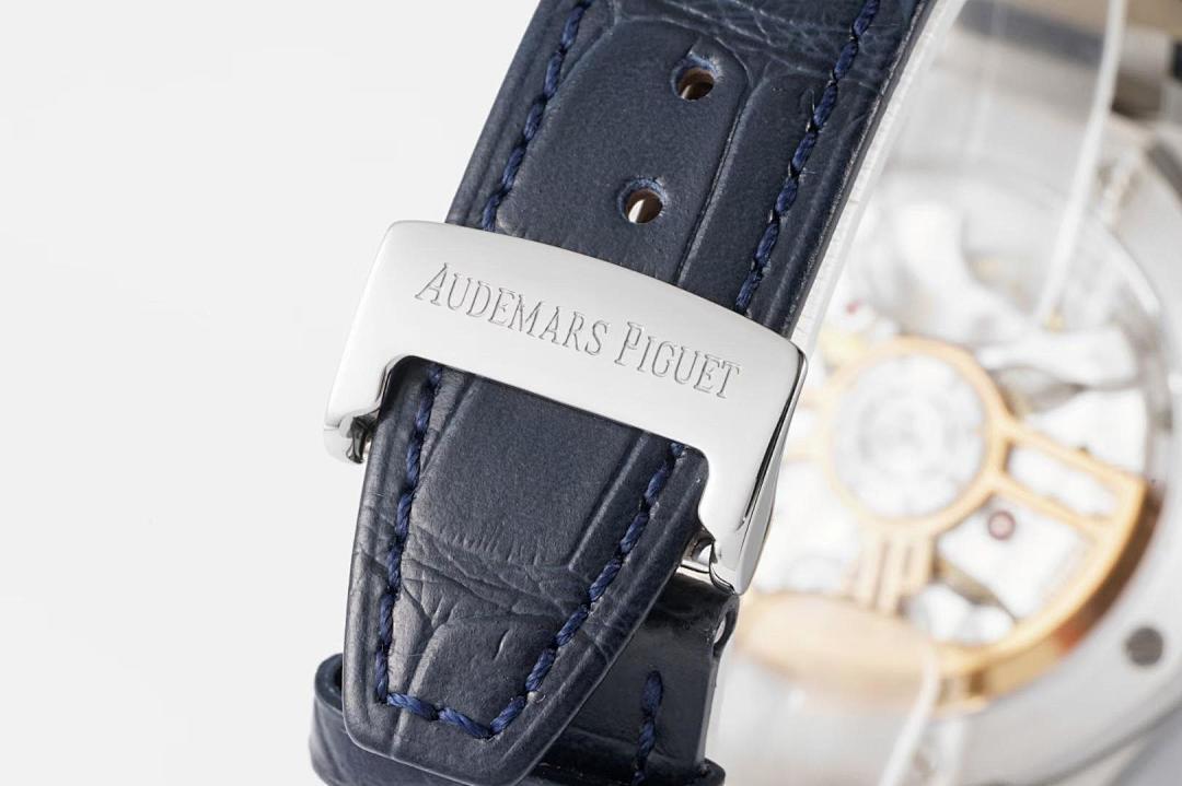 Audemars Piguet Royal Oak watch with blue leather strap and engraved steel buckle