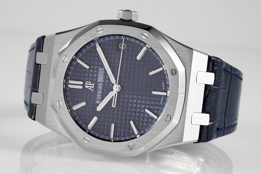 Audemars Piguet Royal Oak watch with blue dial and white baton markers, steel case