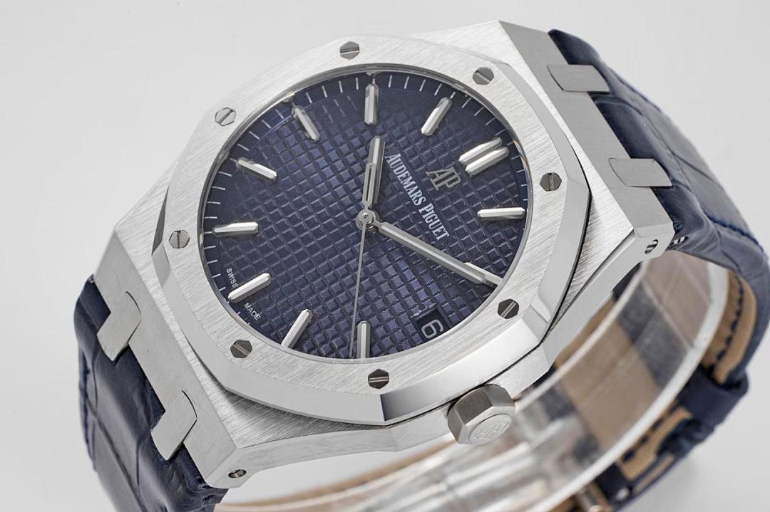 Audemars Piguet Royal Oak watch with blue dial and steel bezel, dark leather strap