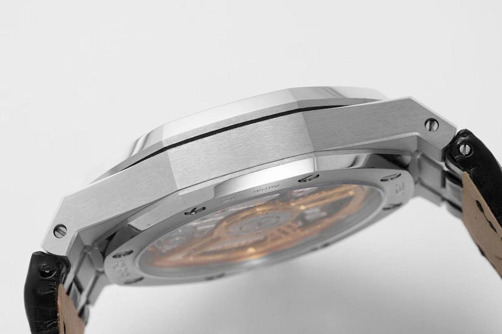 Stainless steel wristwatch case angled view with visible interior through open back