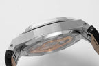 Stainless steel wristwatch case angled view with visible interior through open back