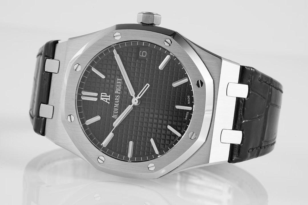 Stainless steel wristwatch with black dial, baton markers, and black leather strap