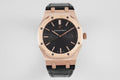 Audemars Piguet Royal Oak watch with rose gold case, black dial, and black leather strap.