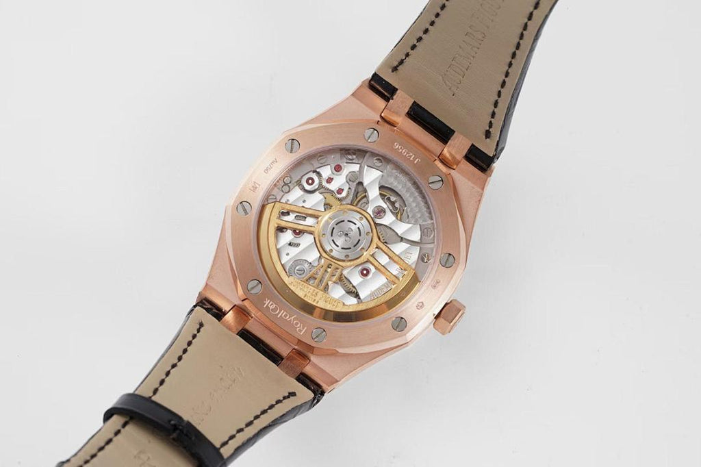Audemars Piguet watch showing skeleton movement, rose gold case, and tan leather strap.