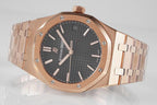 Audemars Piguet rose-gold wristwatch with black textured dial and metal bracelet