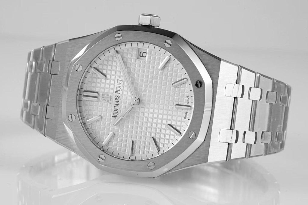 Audemars Piguet wristwatch angled view with silver dial and three-link bracelet