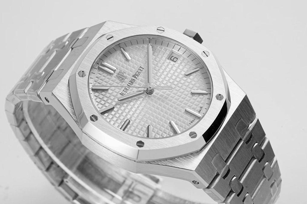 Audemars Piguet wristwatch close-up of silver dial with baton markers and bracelet