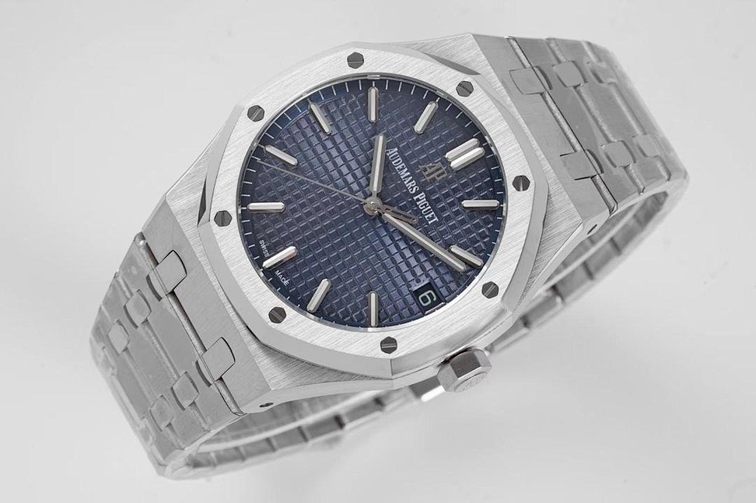 Stainless steel watch with blue textured dial, metal bracelet, angled front view