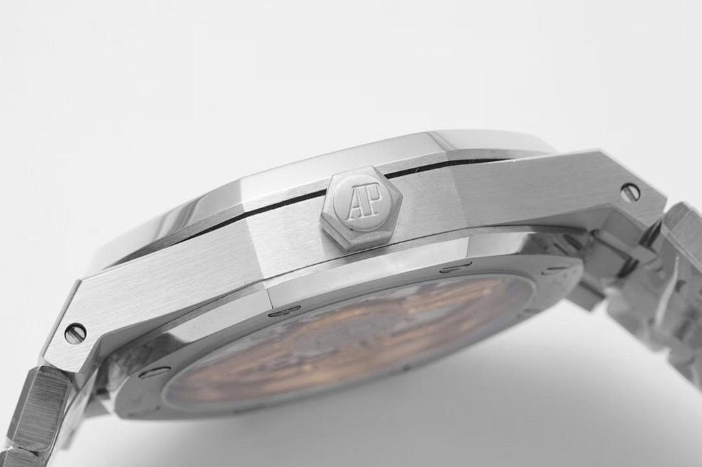 Audemars Piguet watch case top with AP emblem, silver steel bracelet