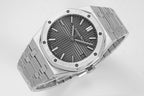 Audemars Piguet watch top view with black textured dial and silver bracelet