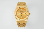 Gold-tone Audemars Piguet watch with textured champagne dial and date at 3