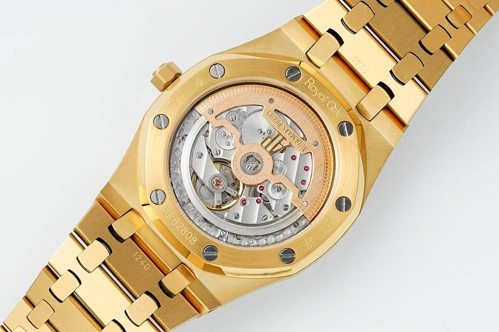 Gold-tone watch case with open view of mechanical movement through sapphire back