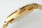 Gold-tone octagonal watch case with crown and integrated bracelet