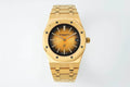 Gold-tone Audemars Piguet automatic watch, black textured dial, baton hands, date 16