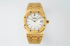 Gold-tone wristwatch with white dial, octagonal bezel, and link bracelet