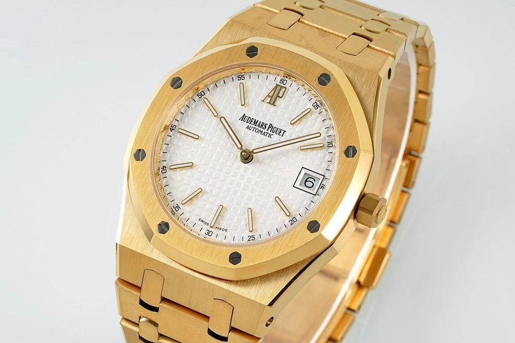 Gold-tone wristwatch front view with white dial, octagonal bezel, and date window