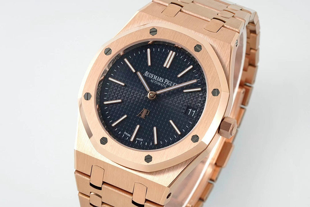 Rose gold-tone wristwatch angled front view with dark blue dial and metal link bracelet.