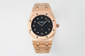 Audemars Piguet rose gold watch with black dial, octagonal bezel, diamond markers