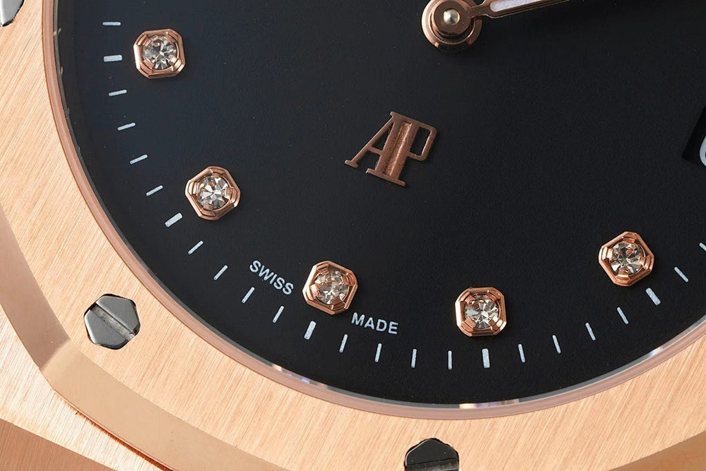 Audemars Piguet black dial close-up with diamond hour markers and AP logo
