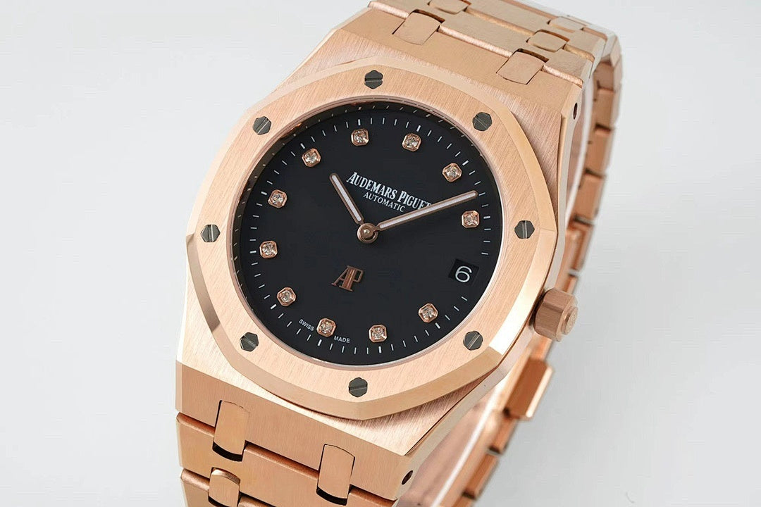 Audemars Piguet rose gold watch with black dial and date window, angled front