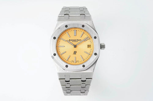 Automatic steel wristwatch, champagne dial, octagonal bezel, metal bracelet