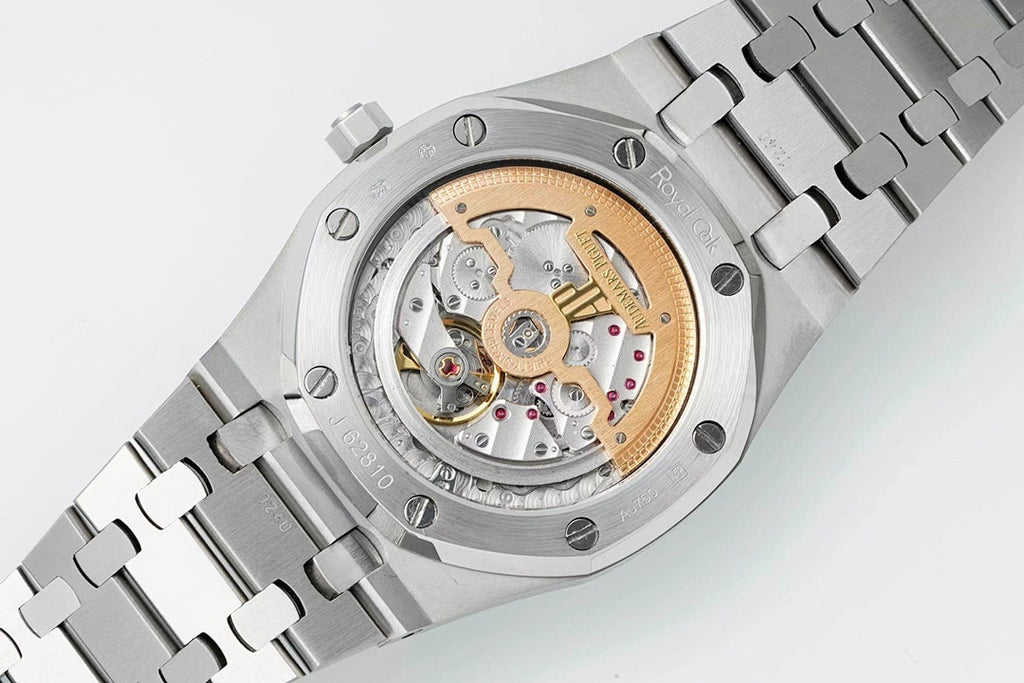 Watch with visible mechanical movement through glass caseback, steel bracelet