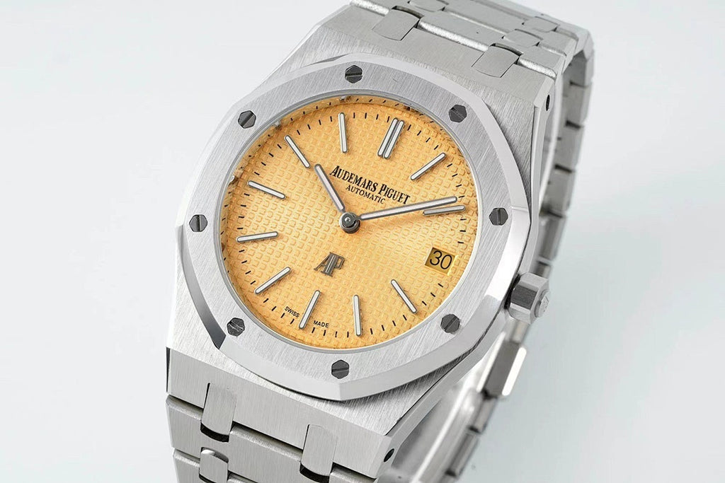 Automatic steel wristwatch with champagne dial, octagonal bezel, crown at 3