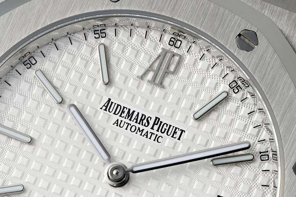Audemars Piguet watch dial close-up with automatic text and silver hour markers