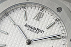 Audemars Piguet watch dial close-up with automatic text and silver hour markers