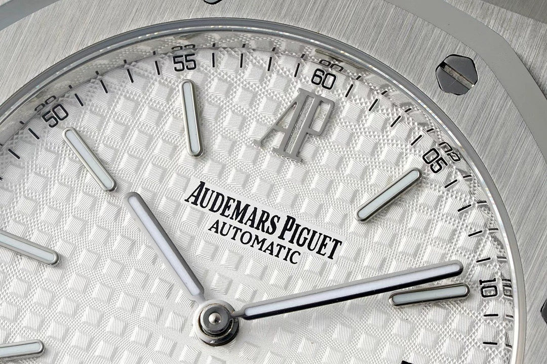 Audemars Piguet watch dial close-up with automatic text and silver hour markers