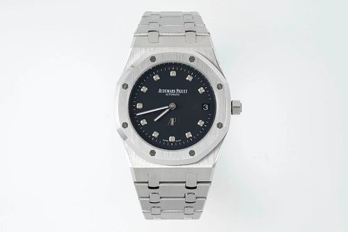 Audemars Piguet steel wristwatch with black dial, octagonal bezel, and link bracelet