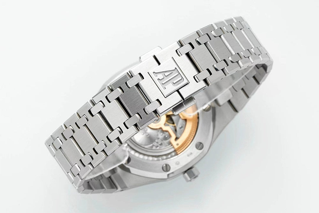Audemars Piguet steel wristwatch with black dial and integrated link bracelet, side view