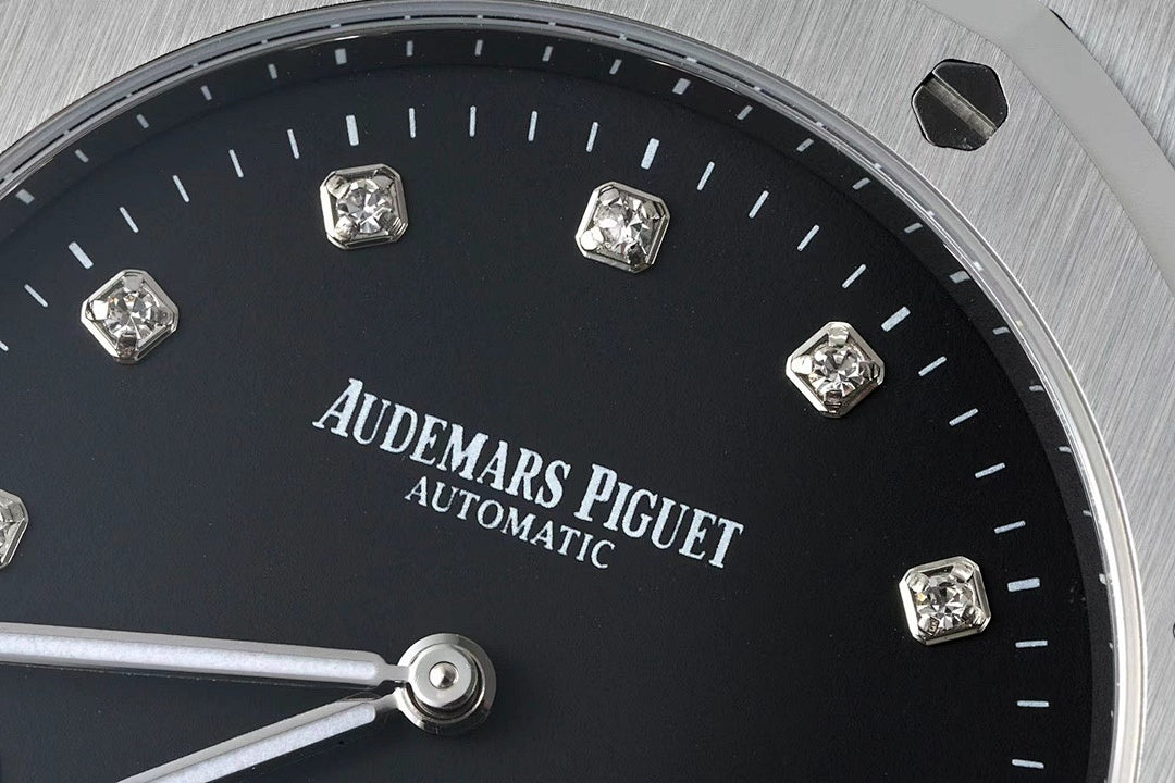Audemars Piguet black dial wristwatch close-up with diamond markers and silver hands