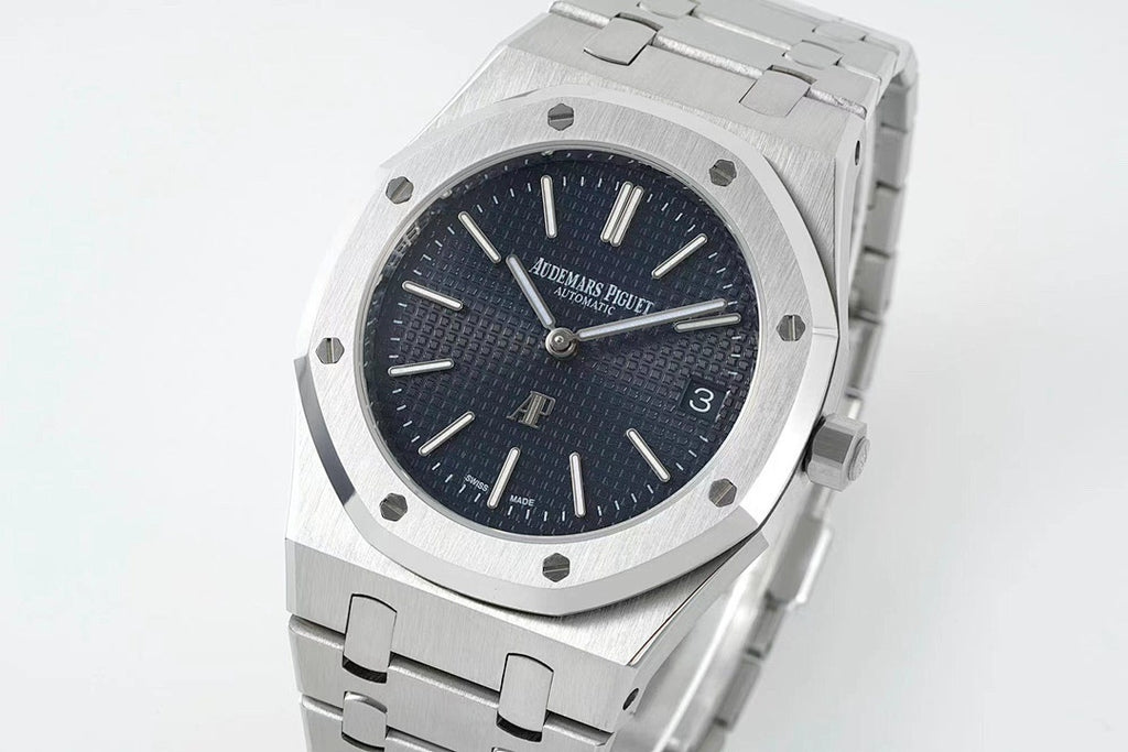 Audemars Piguet stainless steel watch with dark blue dial and baton markers