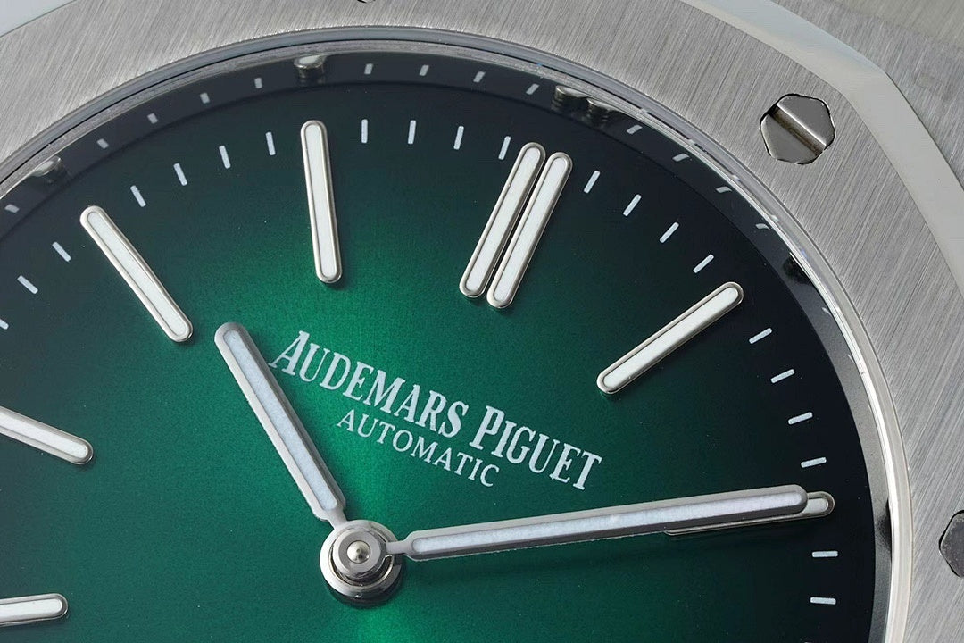 Audemars Piguet automatic watch green dial close-up with silver hour hands and baton markers