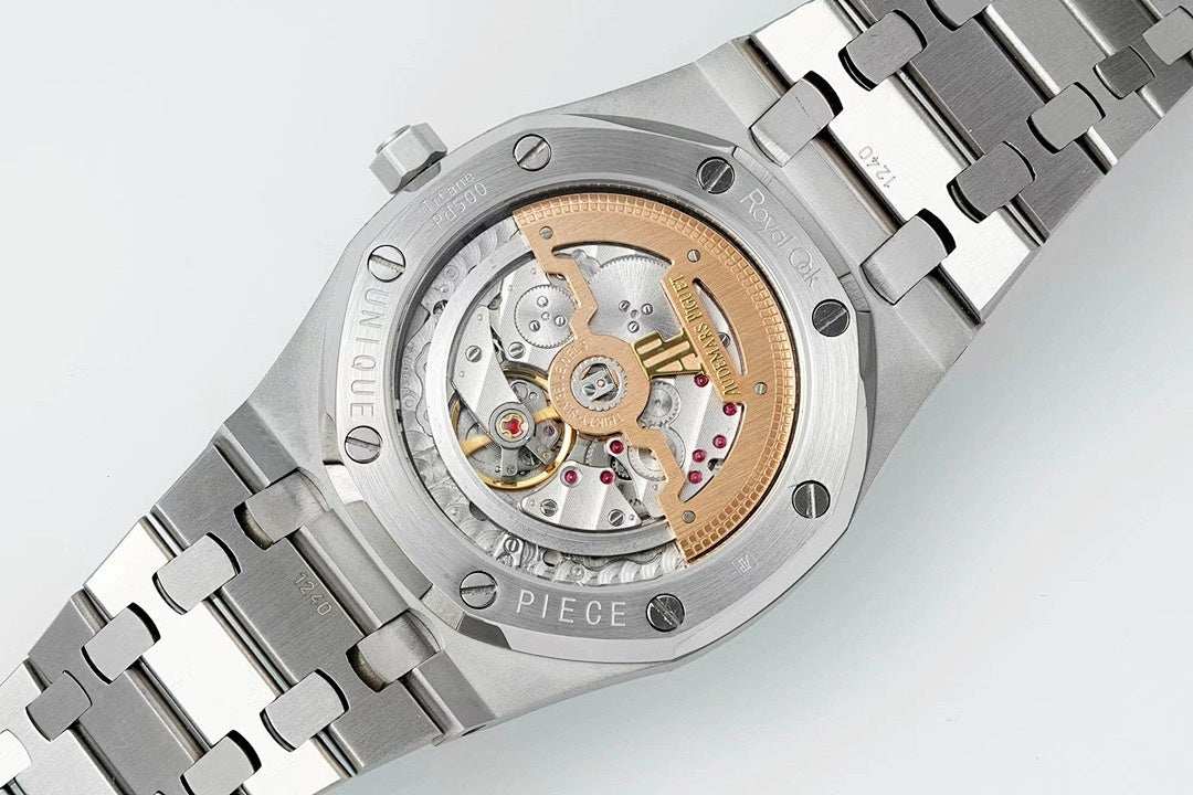 Men's stainless steel wristwatch with open dial showing gold-toned gears