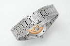 Stainless steel wristwatch with metal clasp and visible caseback details