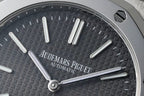 Dark textured dial wristwatch with baton hour markers and two hands