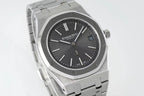 Men's stainless steel wristwatch with dark dial and baton markers