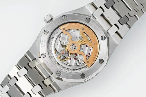 Audemars Piguet watch with exposed mechanical movement, stainless case and metal bracelet